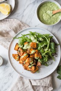 Tamari-roasted sweet potatoes with green tahini dip